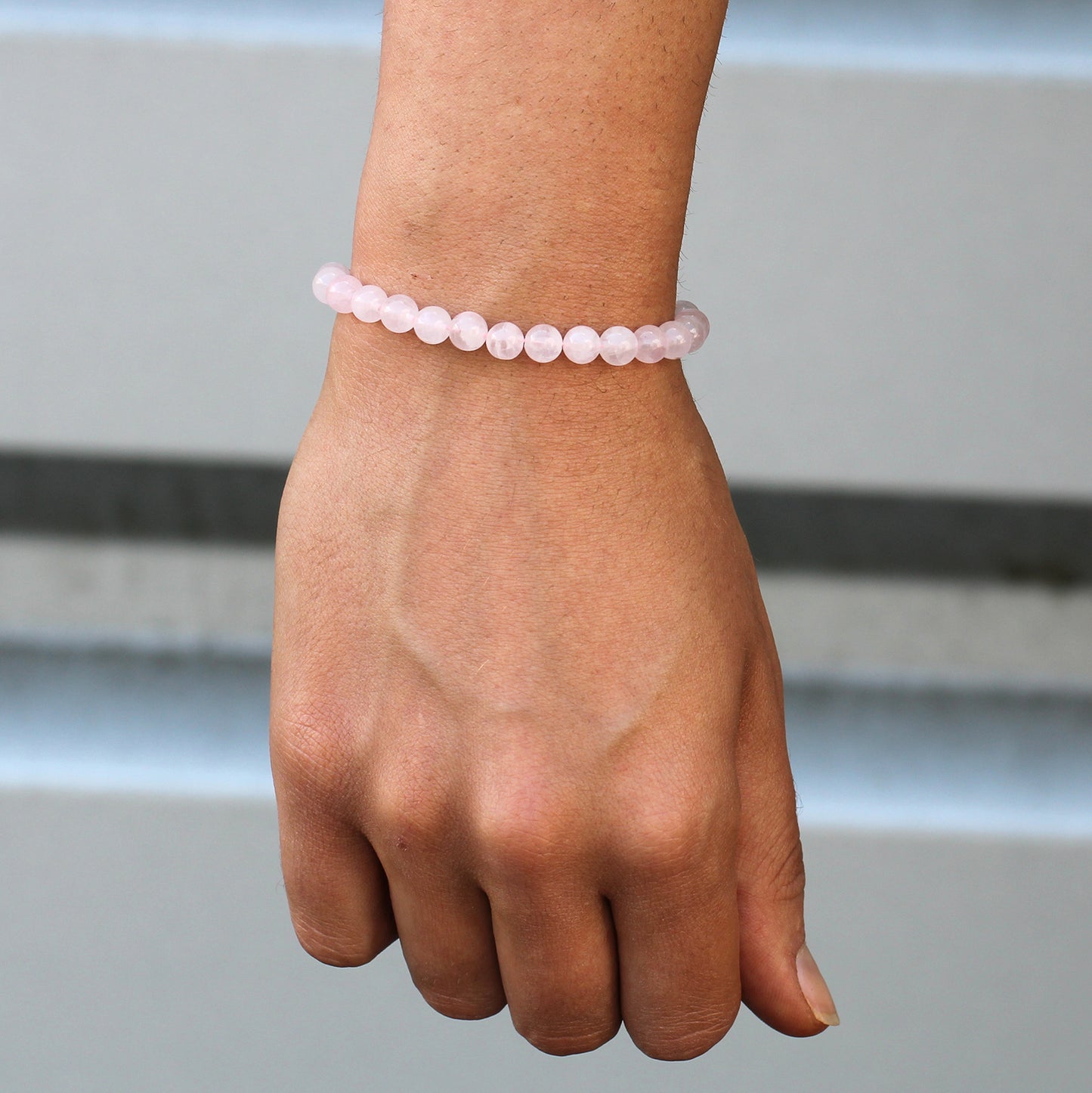 PULSERA AJUSTABLE DE HILO - CUARZO ROSA
