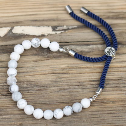 PULSERA AJUSTABLE DE HILO - HOWLITA BLANCA
