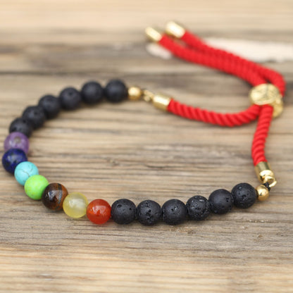 PULSERA AJUSTABLE DE HILO - PIEDRAS VOLCÁNICAS Y CHAKRAS